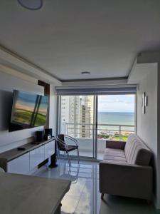 Alojamiento Nuevo en Piso 24 con WiFi Rápido y Vista al Mar, Cerca al Centro Histórico