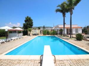 Spacious villa with a large veranda and pool