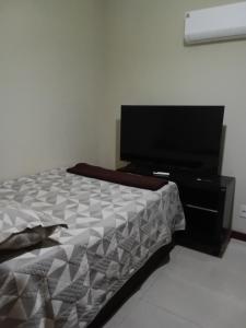 Piscina com churrasqueira