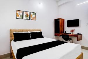 Collection O Panikhaiti Railway Station Formerly Brahmaputra View Guest House