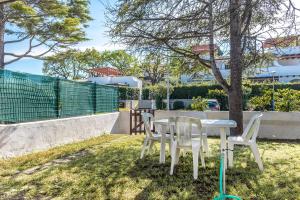 Trilocale con giardino vicino al mare