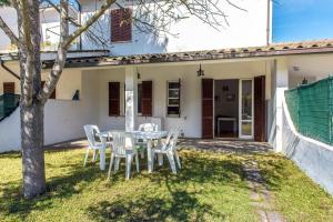 Trilocale con giardino vicino al mare