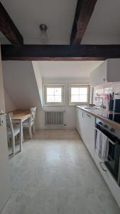 Triple room in a historic half-timbered house