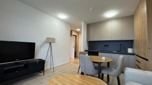 Apartment with balcony near airport with parking