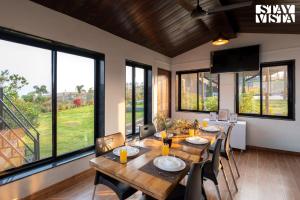 StayVista at The Cloudscape with WiFi, Lawn, AC