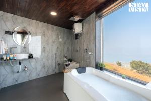 StayVista at The Cloudscape with WiFi, Lawn, AC