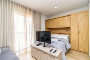 Studio em Prédio com Piscina no Portão - DOR0509B