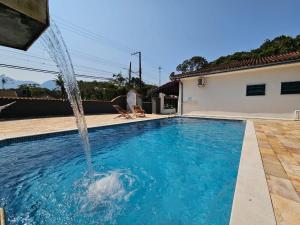 Chalés com Quadra de Areia