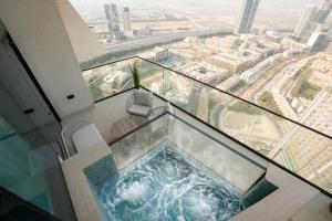 The Royale Beige Jacuzzi Suite 36 2-4 I JVC I Dar Oasis