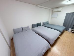 Simple two beds room in center of Osaka