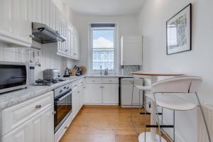 Primrose Hill House, Bedroom with King Bed, Mezzanine Super-King, Double-Height Living Room