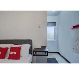 Capital O 3198 Sukomanunggal Inn