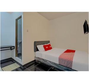 Capital O 3198 Sukomanunggal Inn