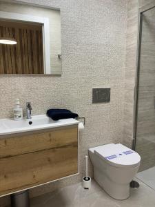 Apartment with rooftop pool 150 m from the beach