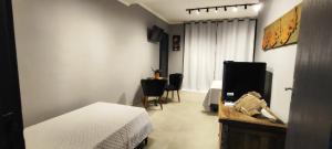 Portal suítes Avenida Paraty