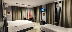 Portal suítes Avenida Paraty