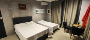 Portal suítes Avenida Paraty