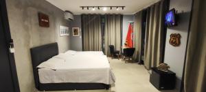 Portal suítes Avenida Paraty