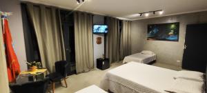 Portal suítes Avenida Paraty