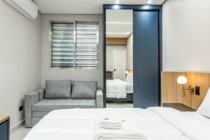 Apto Elegante no Embaré Perto da Praia Ar Cond