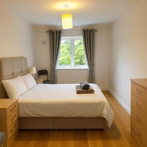 Gracepark Garden Retreat, Spacious 2BR with Balcony & Parking