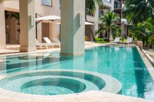 Caribbean Vibes - 4BR - Beachfront Pool & Relax