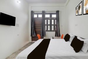 SPOT ON Om Hotel & Restorent