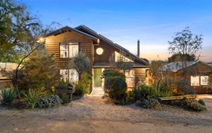 Coastal Timber Escape with Pool