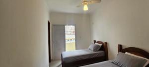 032 Tupi Varanda Mar - 2 Suites com varanda - ar condicionado na sala de Estar e 1 vaga para veículo com portaria 24H e Wi Fi