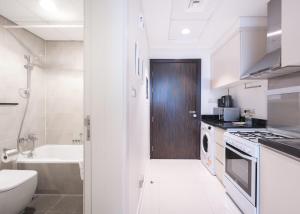 Free housekeeping visits during your stay - StayShort - Damac Hills Sleeps 2 with Balcony