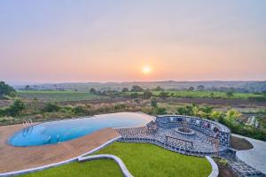 SaffronStays Ashfield - 5BHK Eco-Farmhouse with Pools, Jacuzzi, Lawn & Games Room