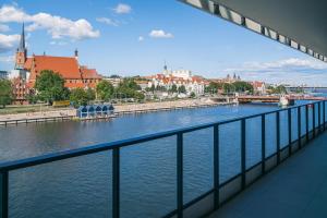 Nad Odrą Szczecin - luksusowy apartament z widokiem na Odrę, tarasem i klimatyzacją