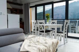 Sunny Apartment with Parking & Balcony with Mountain View by Noclegi Renters