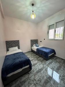 Appartement Moderne a Marrakech - 2 Chambres, Salon et Cuisine Equipee