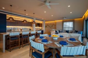 4BR Luxury Beachfront Apt w Heated Pool