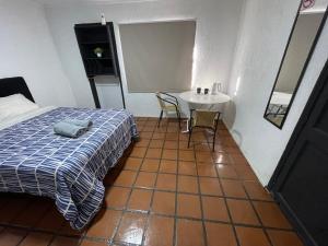 Habitación doble superior en el centro, con baño