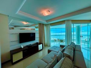 Apto c varanda gourmet à beira-mar RKR0502