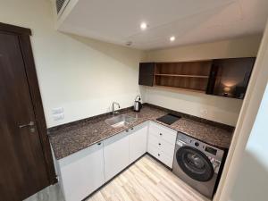 Nuzul Stay Luxury City Studio Near Airport