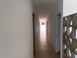 Suite numero 3 BEIRA MAR com ar condicionado , cozinha compartilhada e completa com Micro ondas air fryer forno elétrico fogão Geladeira freezer gelagua e cafeteria elétrica Tudo para vc se sentir em casa além de um Deck com churrasqueira vista m