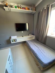 Casa 800 metros da praia de ingleses, três quartos