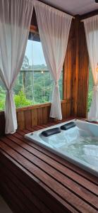 Chalé Romântico com Banheira