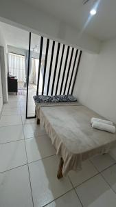 Kitnet a 1,6km da praia