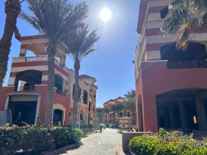 Cosy Studio with a Lovely Balcony & Pool View in La Syrena Resort with Free Pool Access