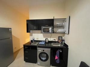 Cosy Studio with a Lovely Balcony & Pool View in La Syrena Resort with Free Pool Access