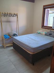 Casa com piscina no Laranjal