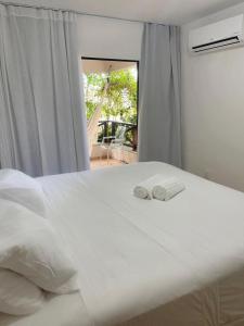 Apto EnCanto do Mar - Apenas 50m da praia e piscinas! Aquaville Resort