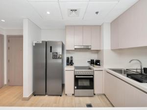 Elite Nest - Upscale 4BR with PS5 Lounge - Formula 1 and Ferrari World