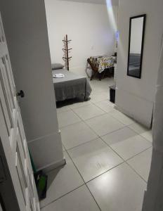 Kitnet em Garatucaia Fundos