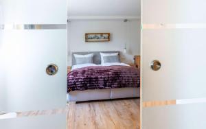 Ferienwohnung "Hirschbergsuite" - Mit Hotelfrühstück, Sauna, fast direkt am See