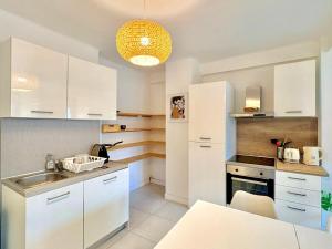 Le Colbert, spacieux, 4 chambres, 4 salles de bain